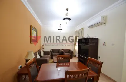 Living / Dining Room image for: Apartment - 2 Bedrooms - 2 Bathrooms for rent in Ain Khaled - Ain Khaled - Doha, Image 1