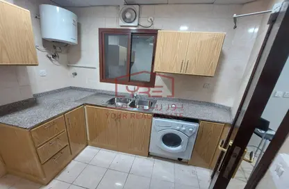 Kitchen image for: Apartment - 2 Bedrooms - 2 Bathrooms for rent in Al Muntazah Street - Al Muntazah - Doha, Image 1