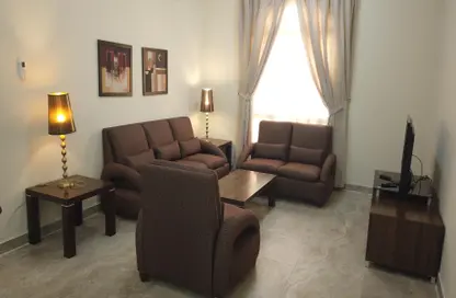 Living Room image for: Apartment - 2 Bedrooms - 2 Bathrooms for rent in Al Nasr Street - Al Nasr - Doha, Image 1