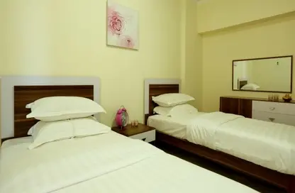 صورة لـ غرفة- غرفة النوم شقة - 3 غرف نوم - 2 حمامات للايجار في مشيرب - مشيرب - الدوحة ، صورة رقم 1