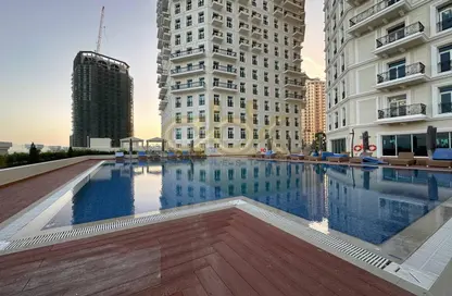 Pool image for: Apartment - 1 Bedroom - 2 Bathrooms for rent in The Garden - Floresta Gardens - The Pearl Island - Doha, Image 1